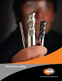 A man is holding three different types of drill bits in his hand.