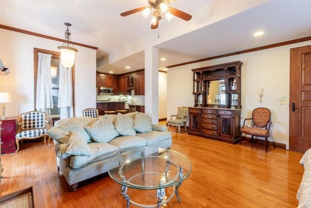 A house with a porch and stairs is being remodeled.