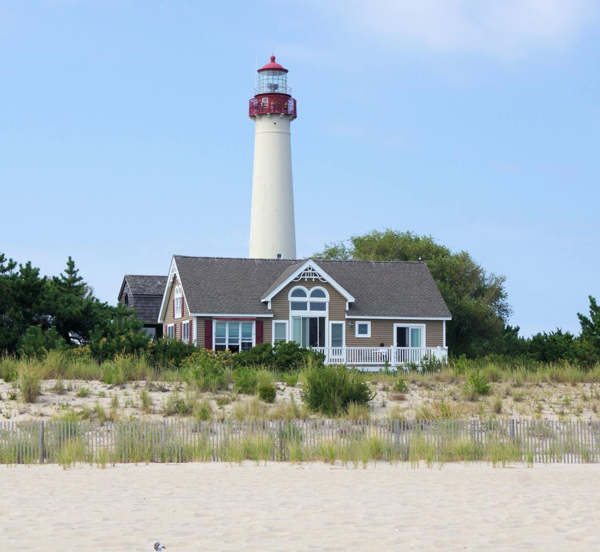 A house with a lighthouse on top of it
