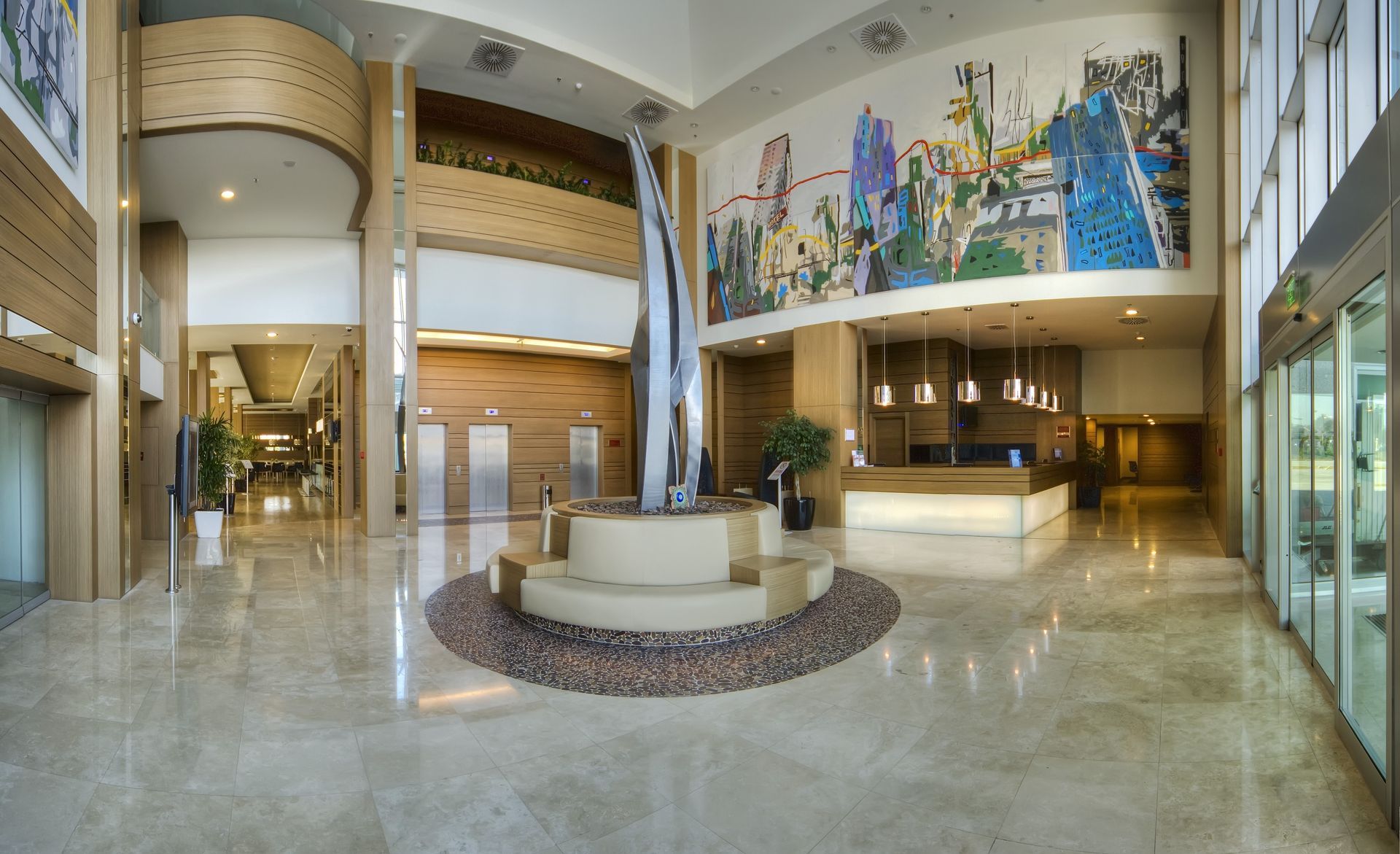 A large lobby with a statue in the middle of it