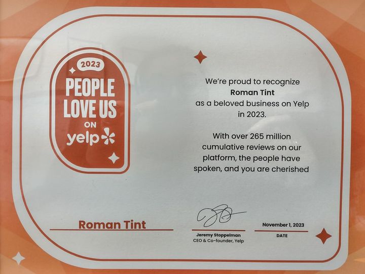 A certificate that says people love us on yelp