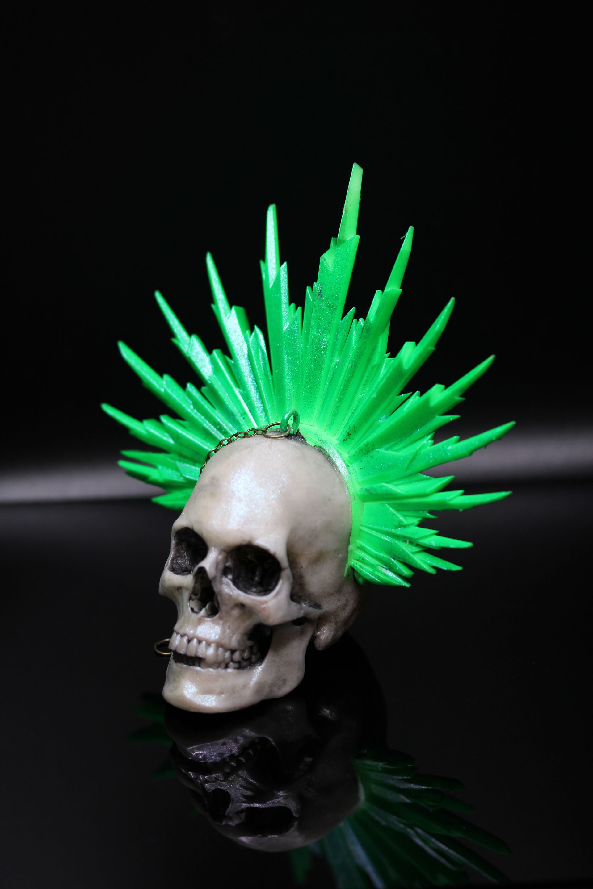 Skull With Rays:  White Skull w/ Green Rays