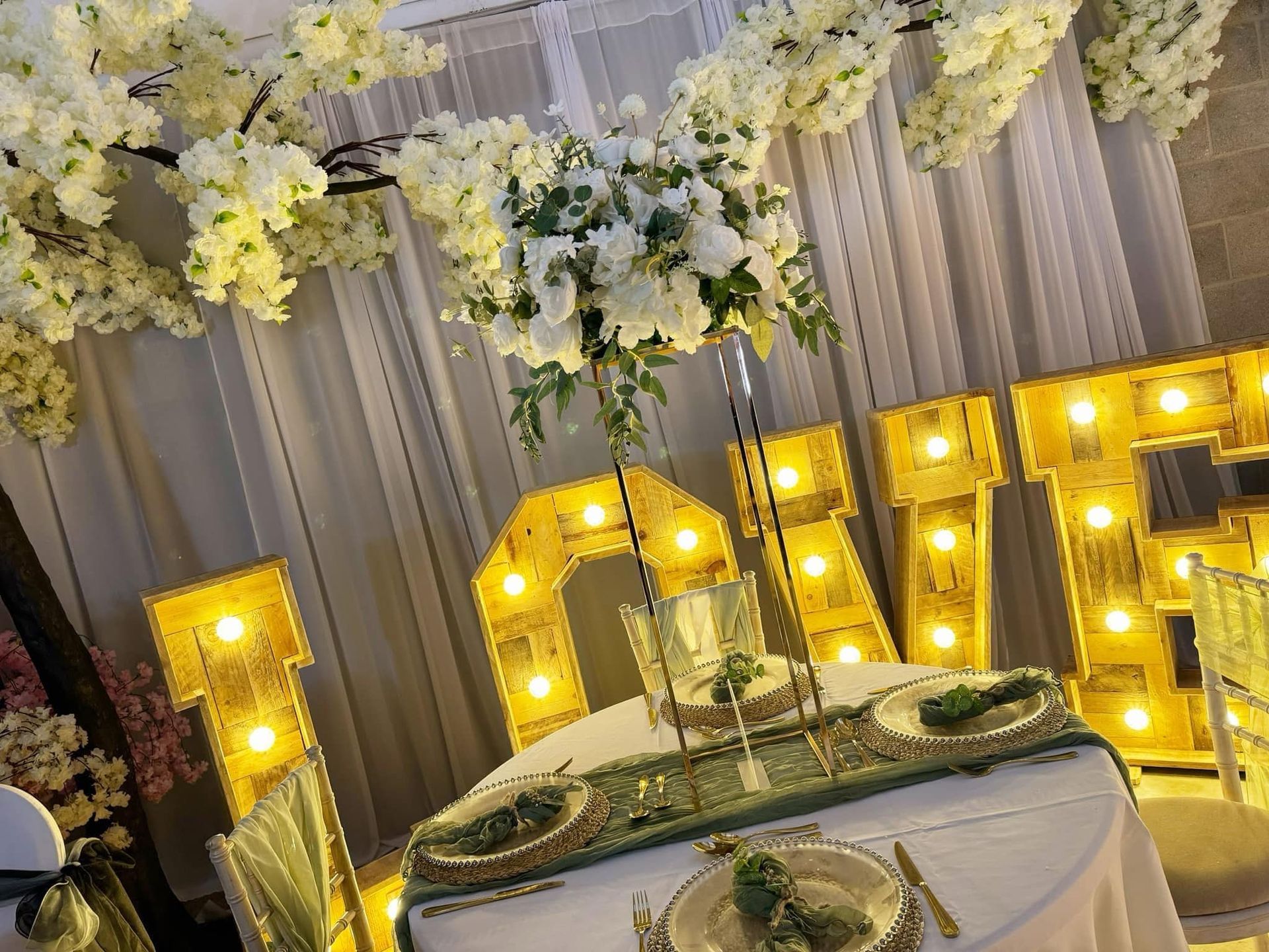 Romantic table setting with glowing 