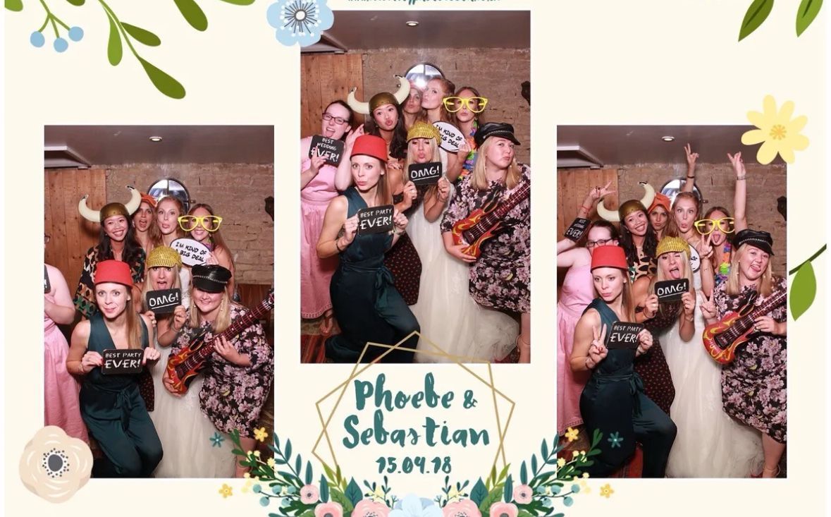 Wedding photo booth strip: Bride and friends pose with props, floral decorations.