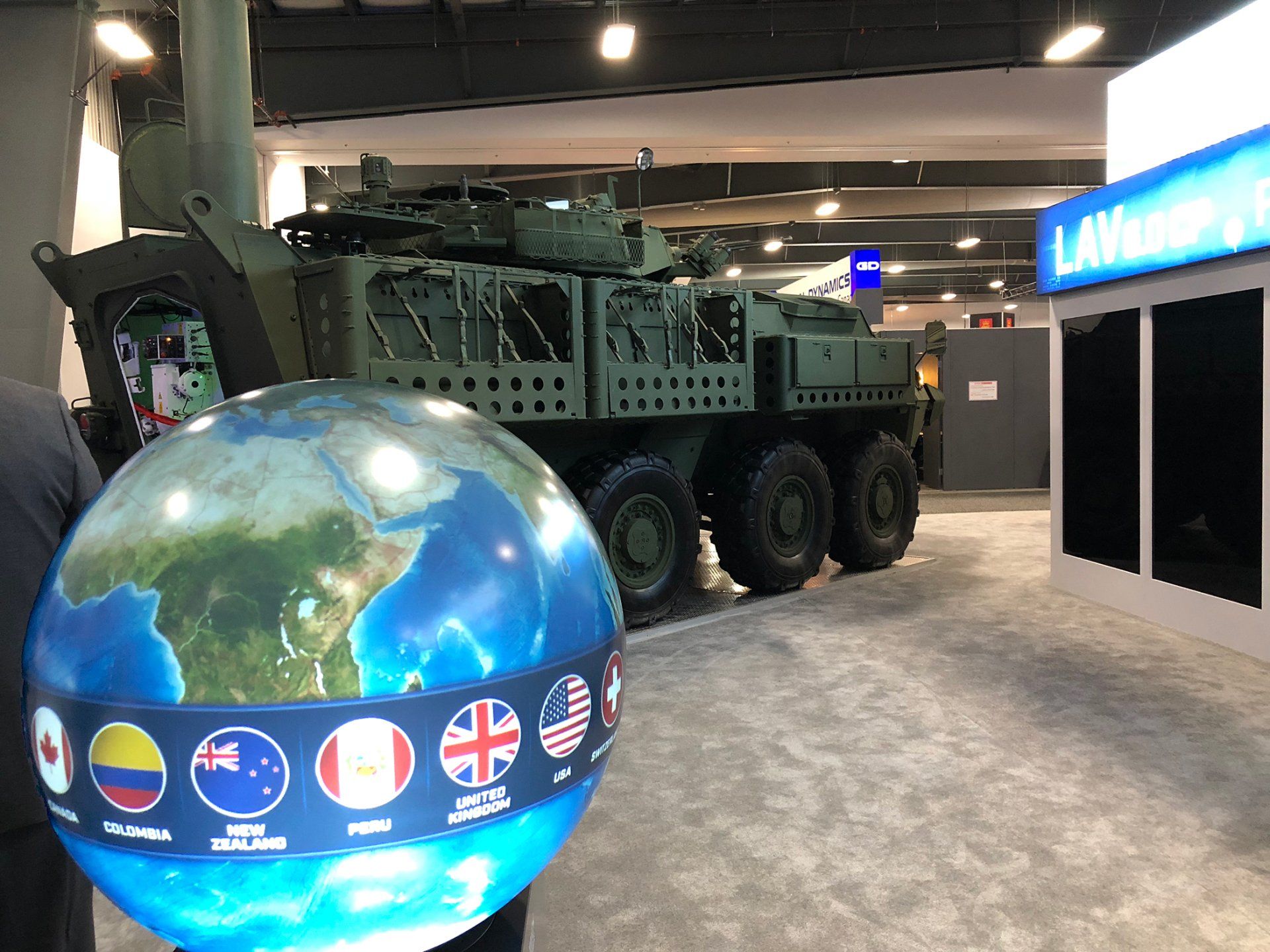 Pufferfish Interactive Spherical Display in front of GDLS LAV 6.0