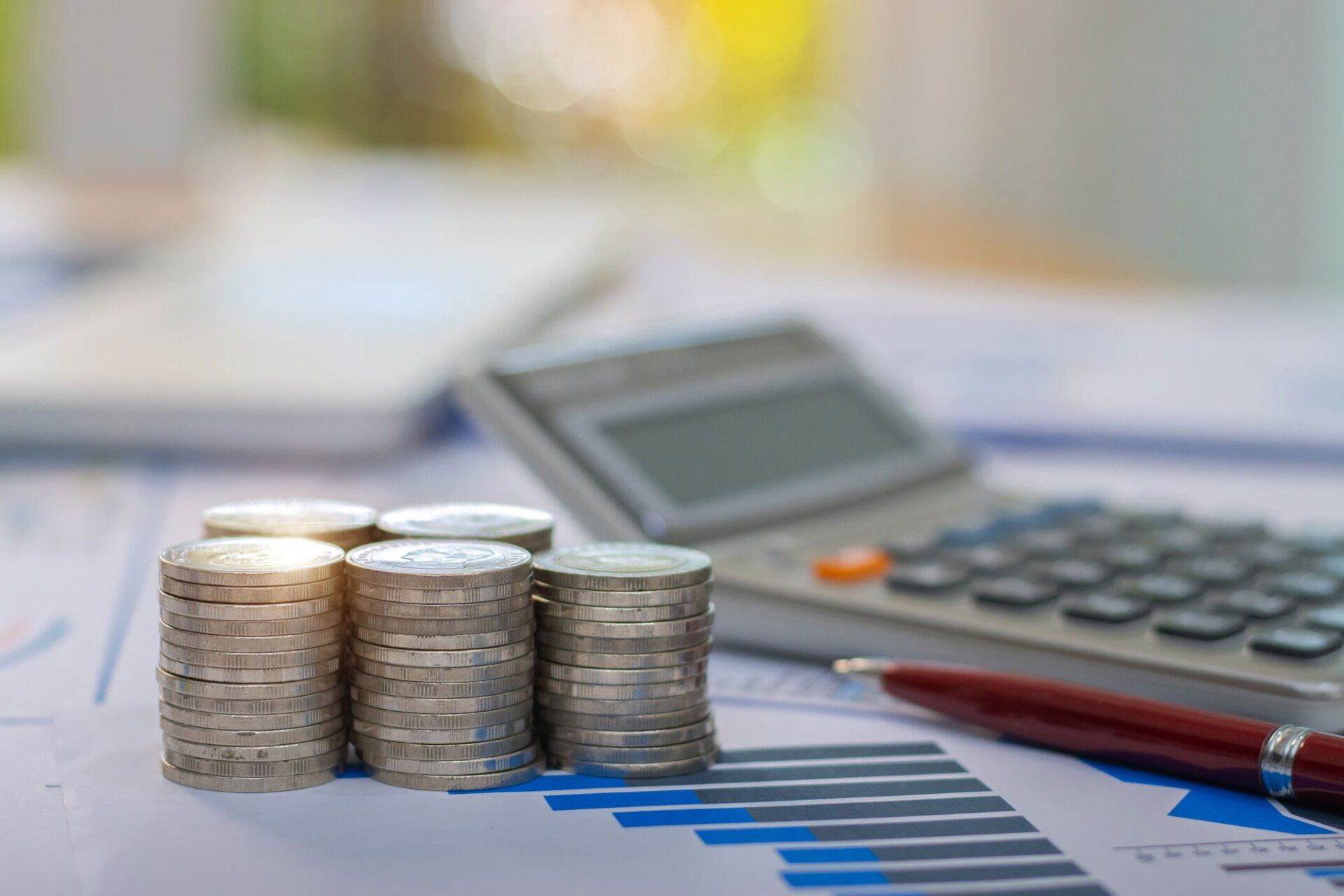 Coins with Calculator and Pen — Spartanburg, SC — S. Reel Robertson, CPA, PA