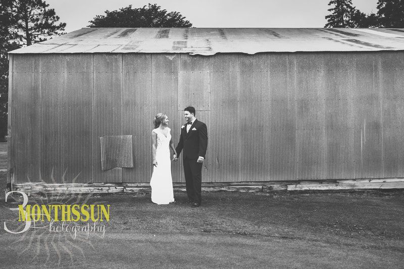 A black and white photo of a bride and groom taken by montisun photography