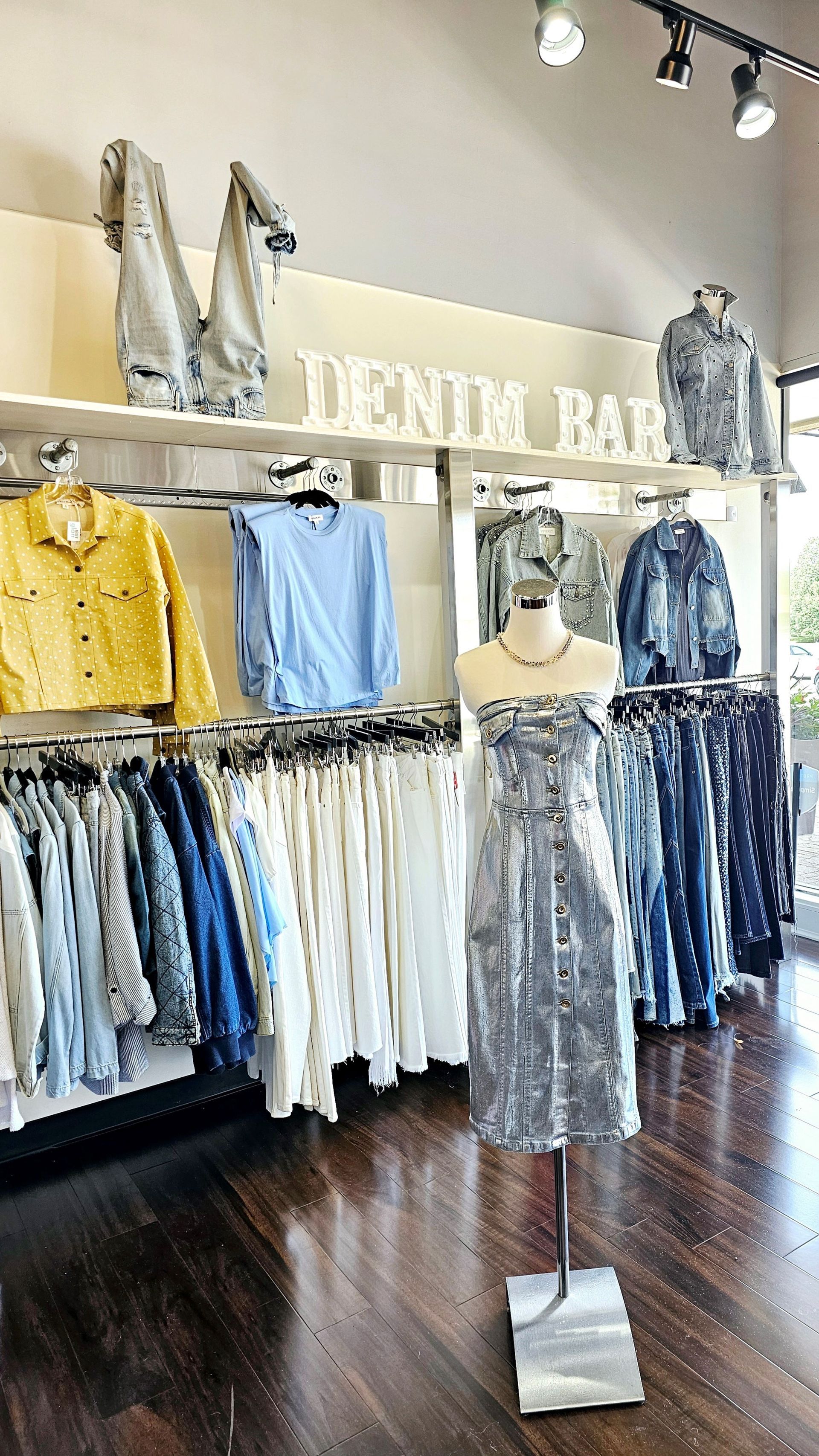 women's denim bar with denim pants and jackets at Next in Glam boutique in Naperville