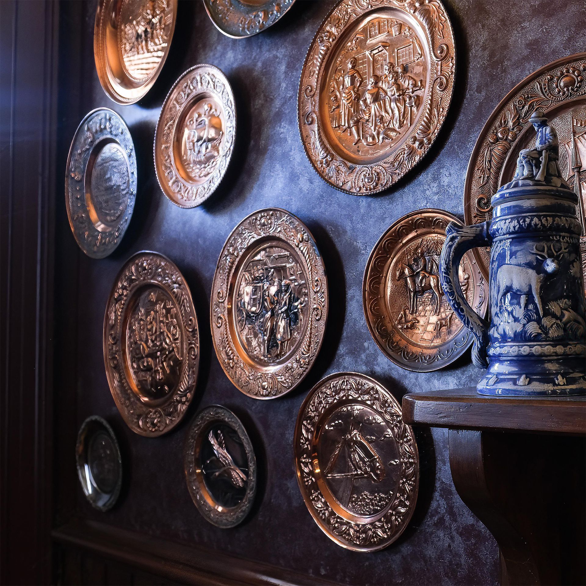 Historical copper plates on display in the bar room