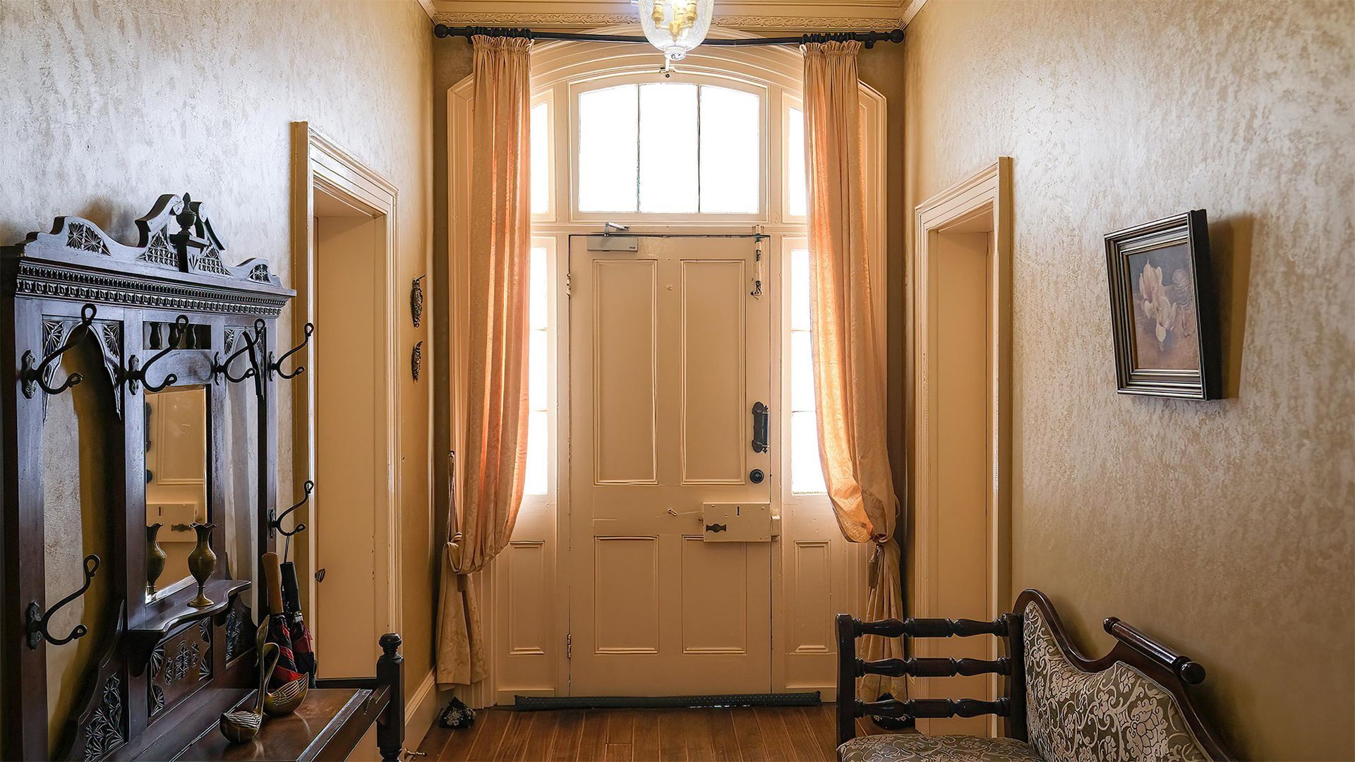 the front doorway of the historical house entrance seen from the inside