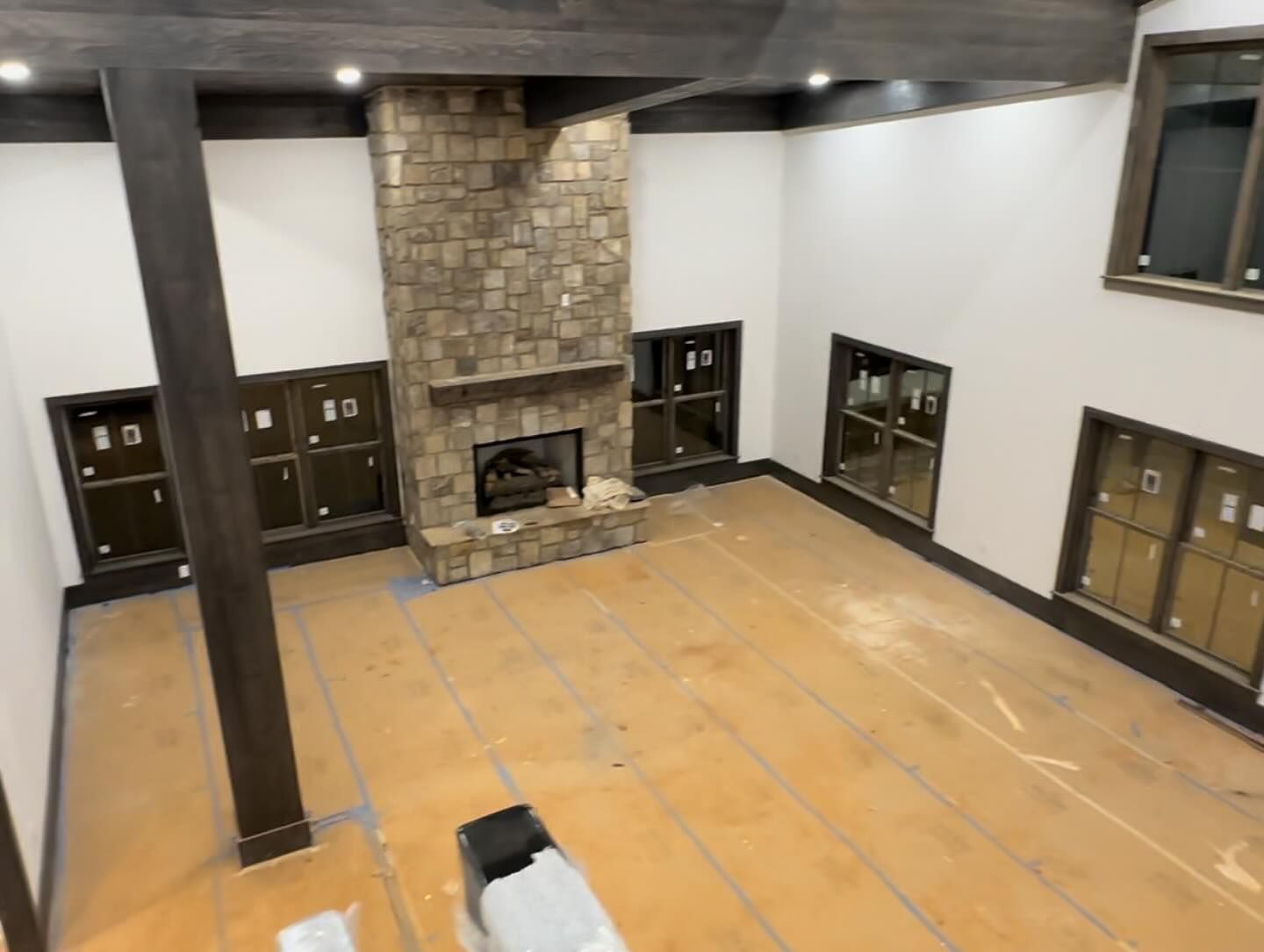 There is a fireplace in the middle of the room.