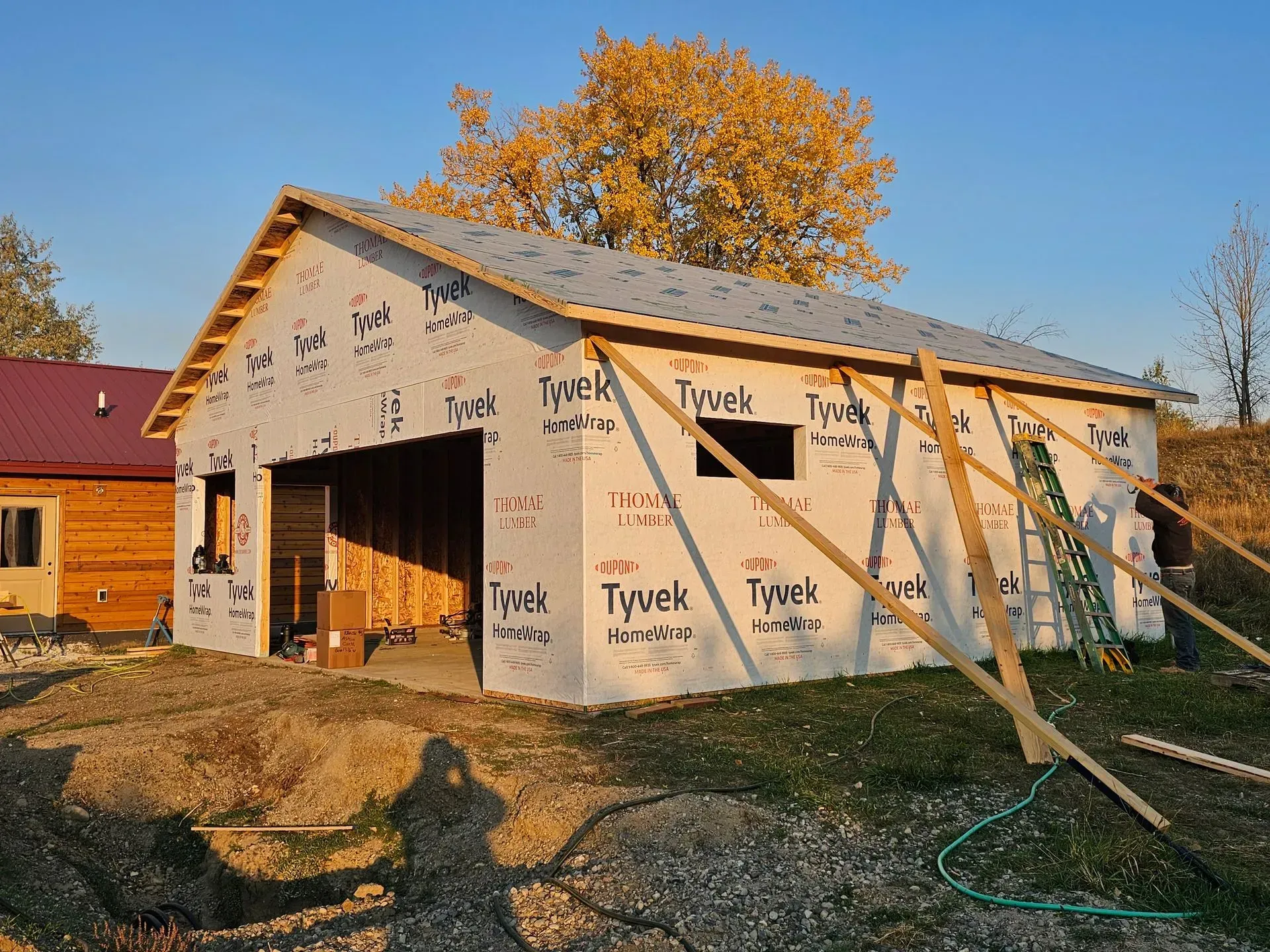 A garage is being built with tyvek insulation
