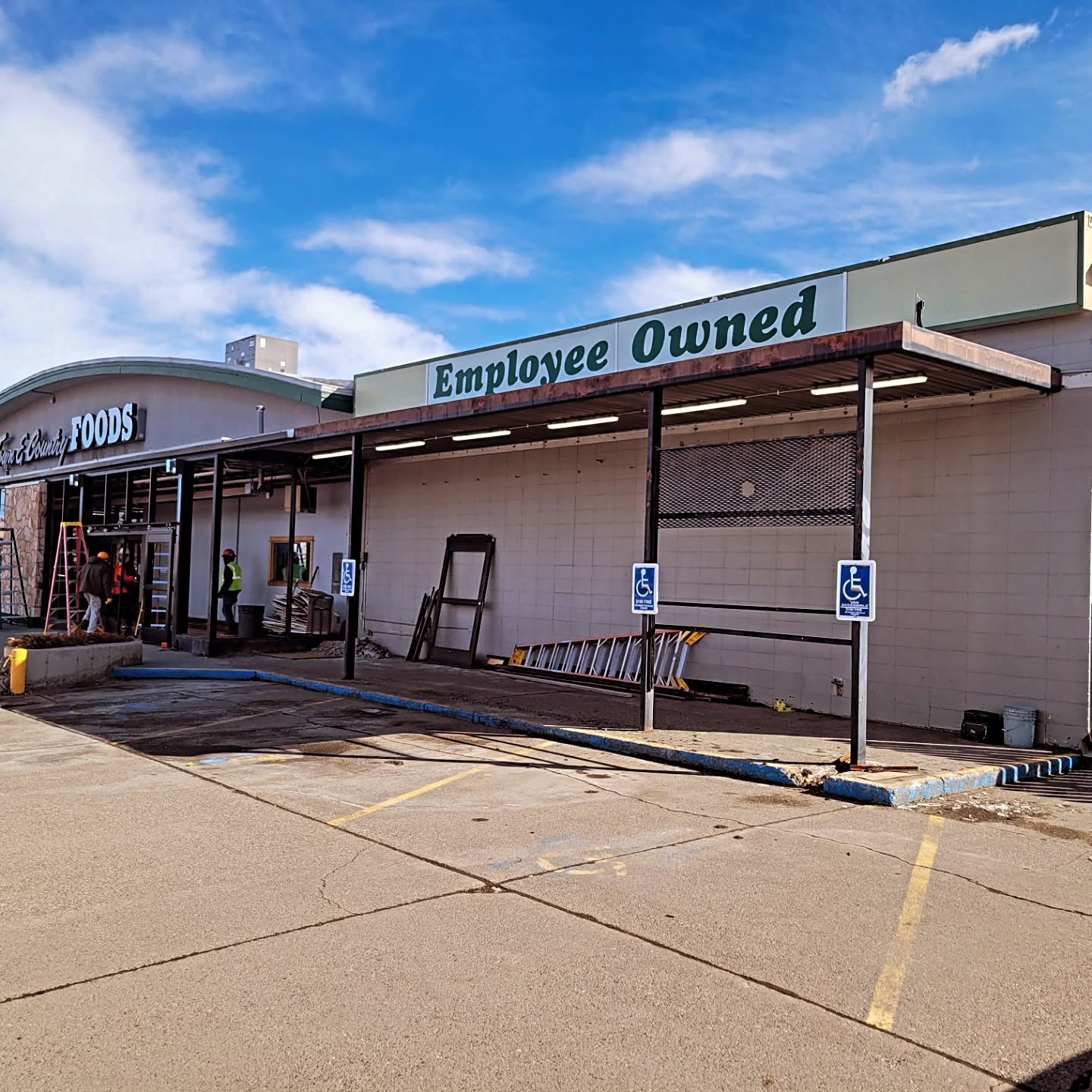 A store front with a sign that says employee owned