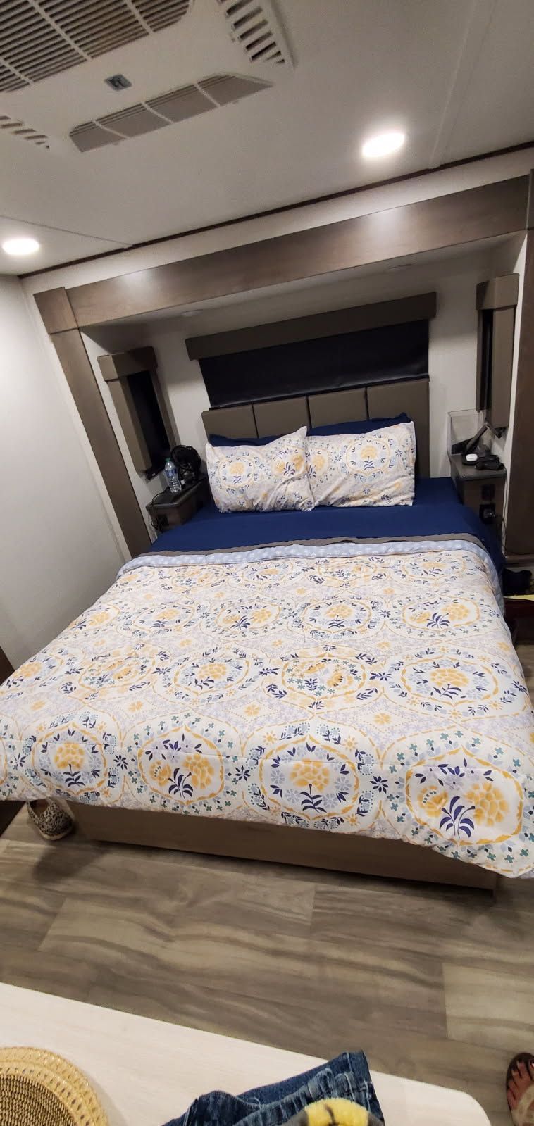 There is a large bed in the middle of the room.