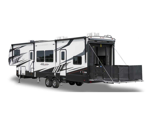 A white and black rv is parked on a white background.