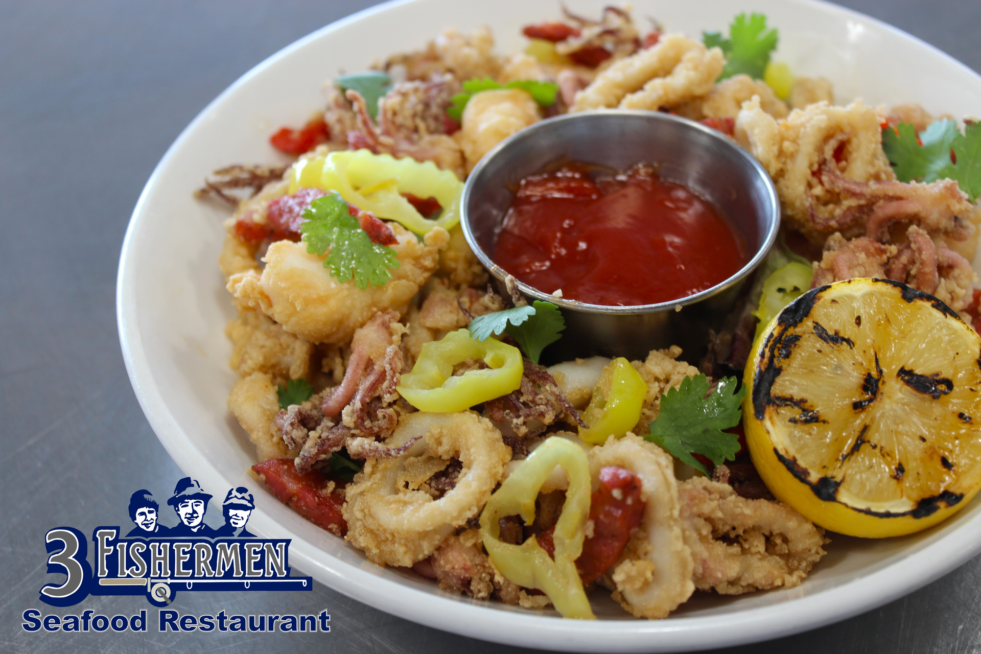 A plate of food from the 3 fishermen seafood restaurant