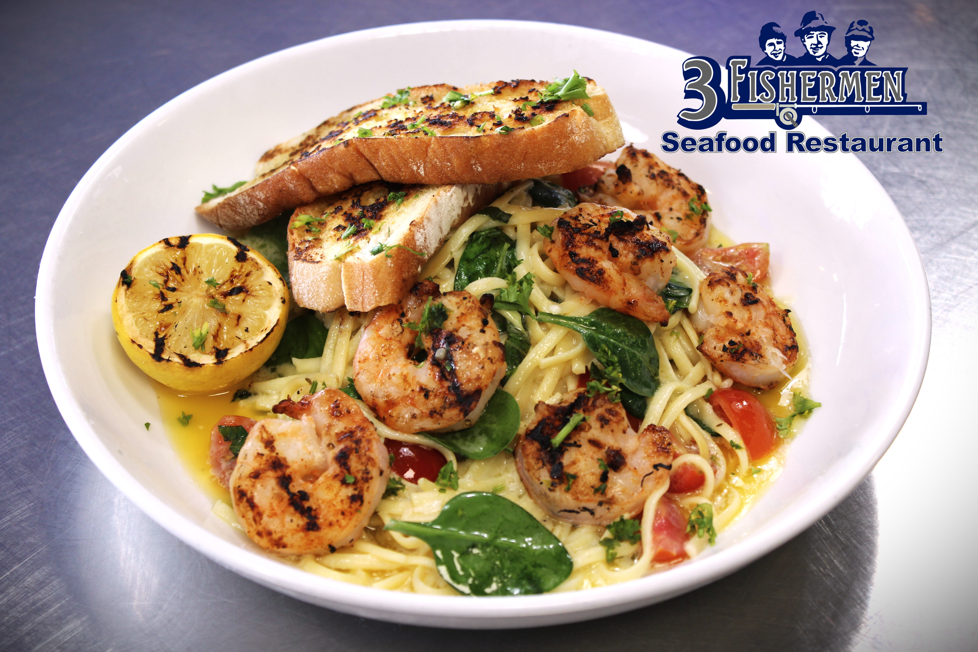 A bowl of shrimp and noodles from a seafood restaurant