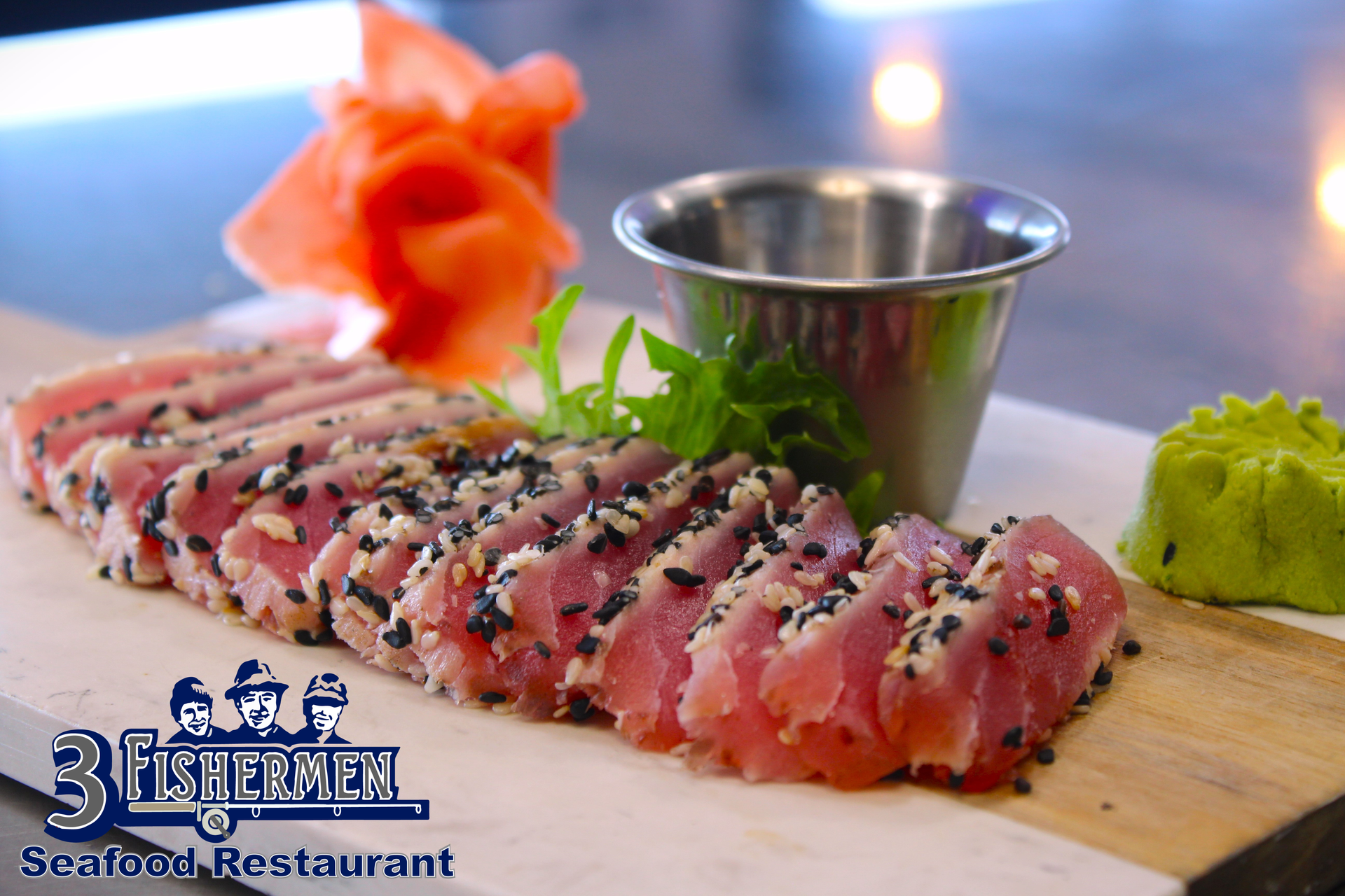 A plate of food with a seafood restaurant logo on it