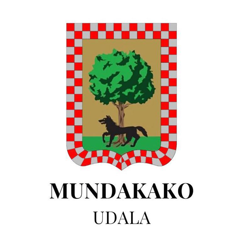 Escudo de Mundaka, País Vasco: árbol verde, lobo negro, cenefa roja y plata.