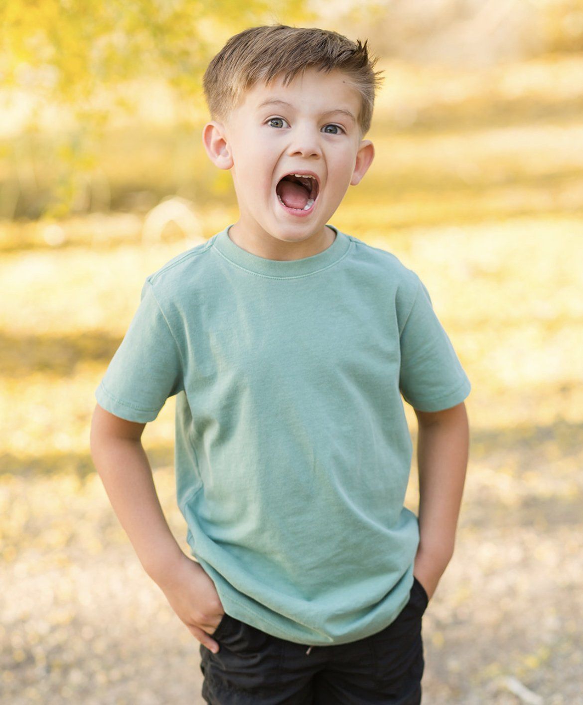 young boy tongue out