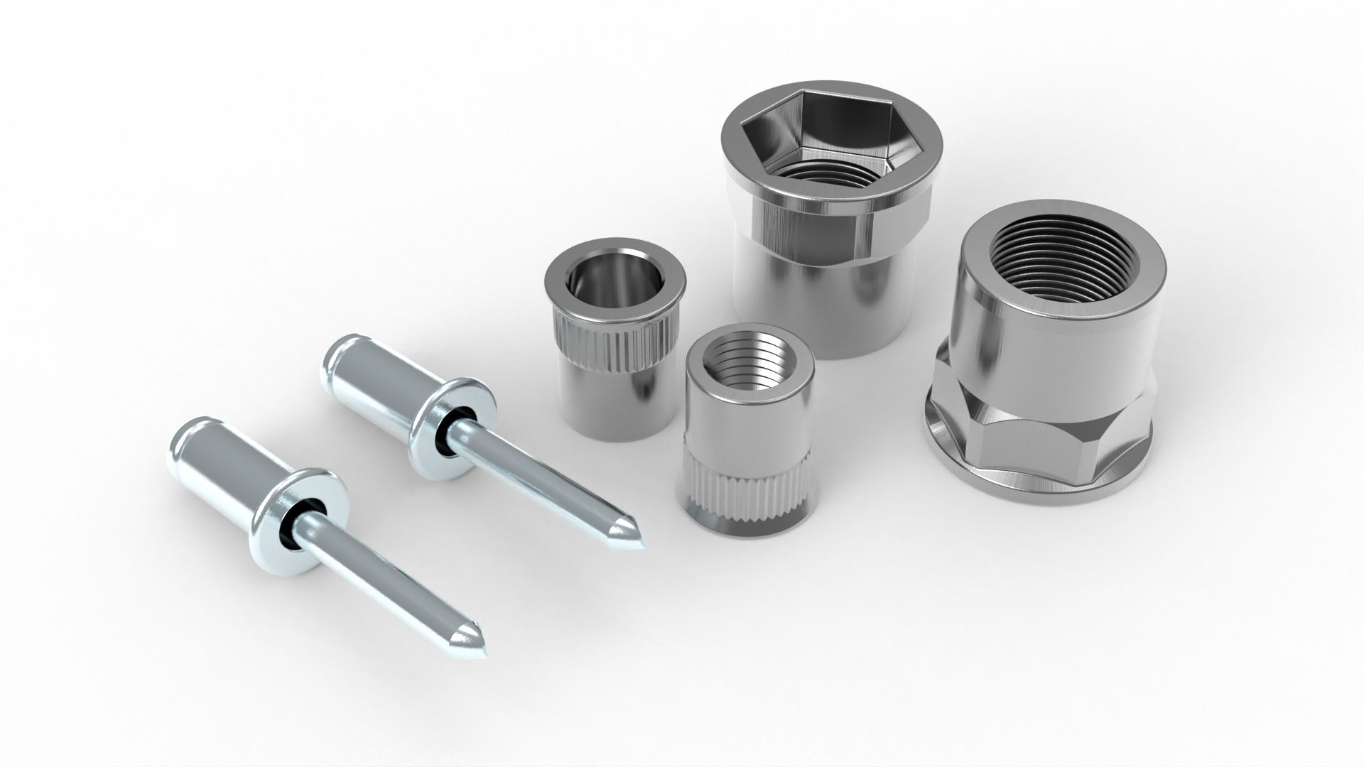 Metal rivets and threaded inserts on white background.