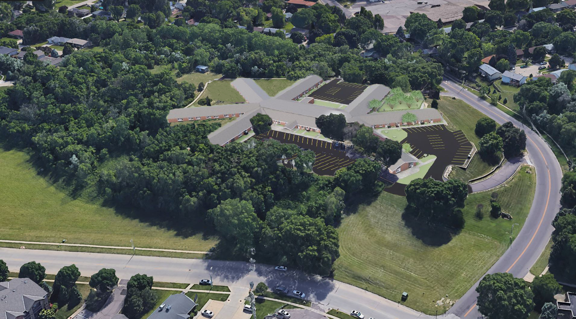 An aerial view of a residential area with lots of trees