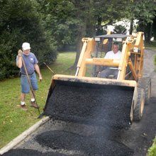 Dumping asphalt