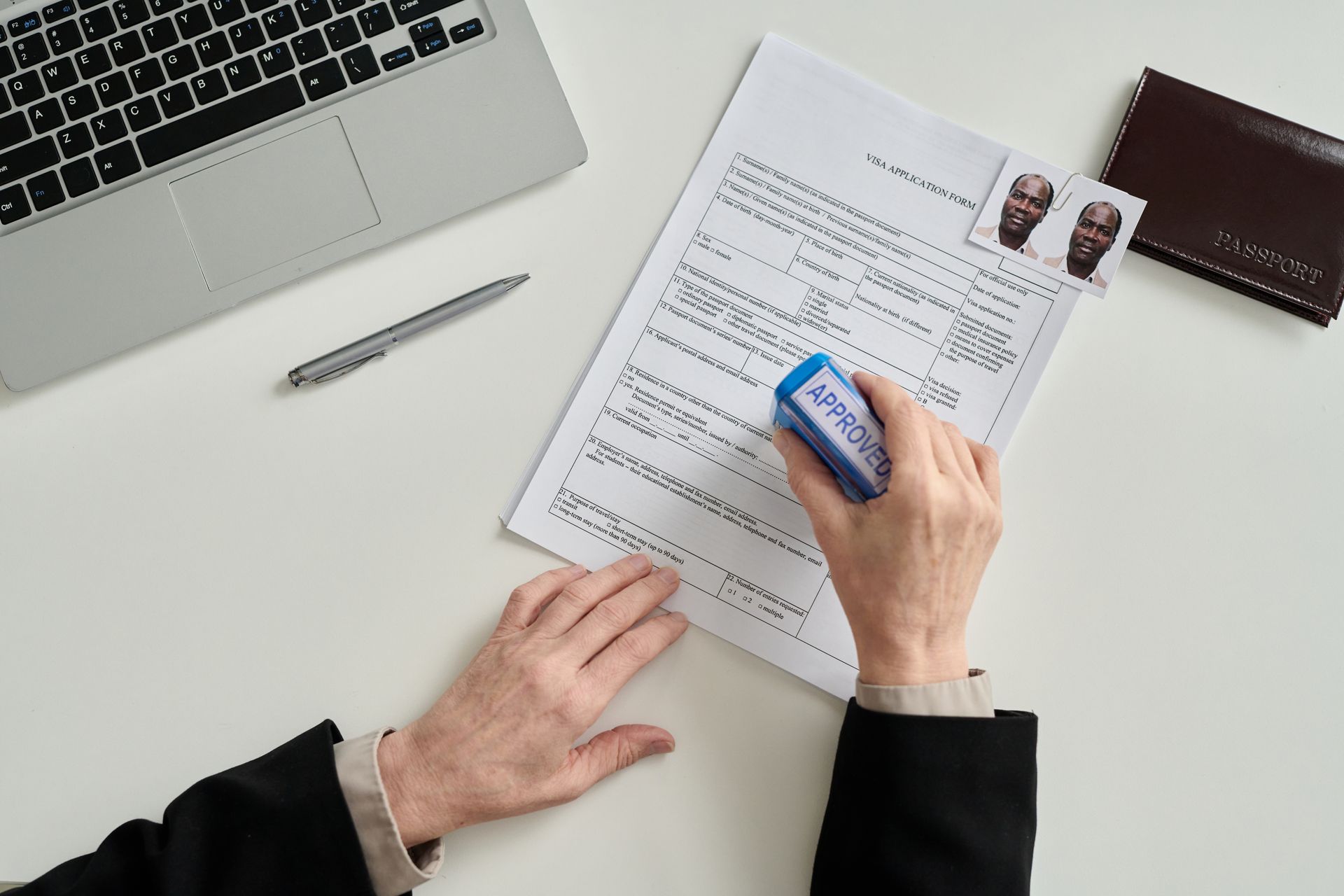 Person Erasing Something on a Document — Immigration Agents in Cairns North, QLD