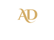 Gold “AD” monogram logo on a white background
