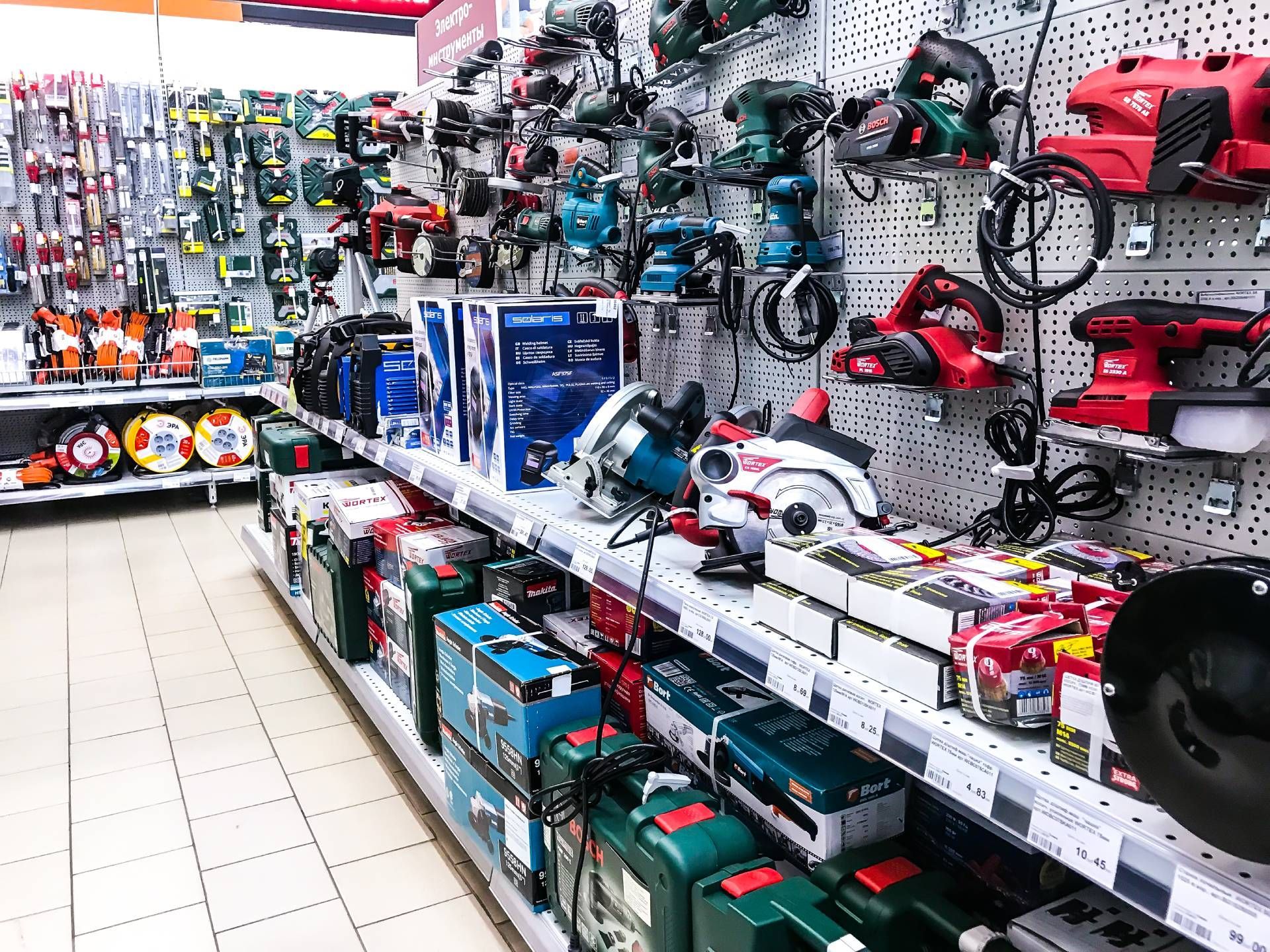 Tools and equipment displayed on shelves in a hardware store.