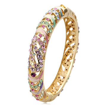 Gold bangle bracelet with colorful gems and enamel details.