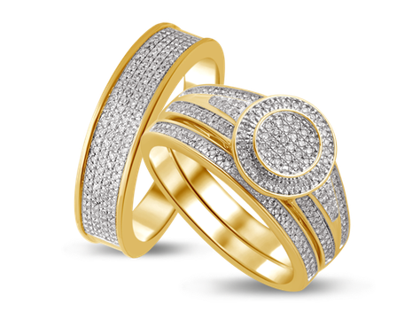 Gold wedding rings set with small diamonds.