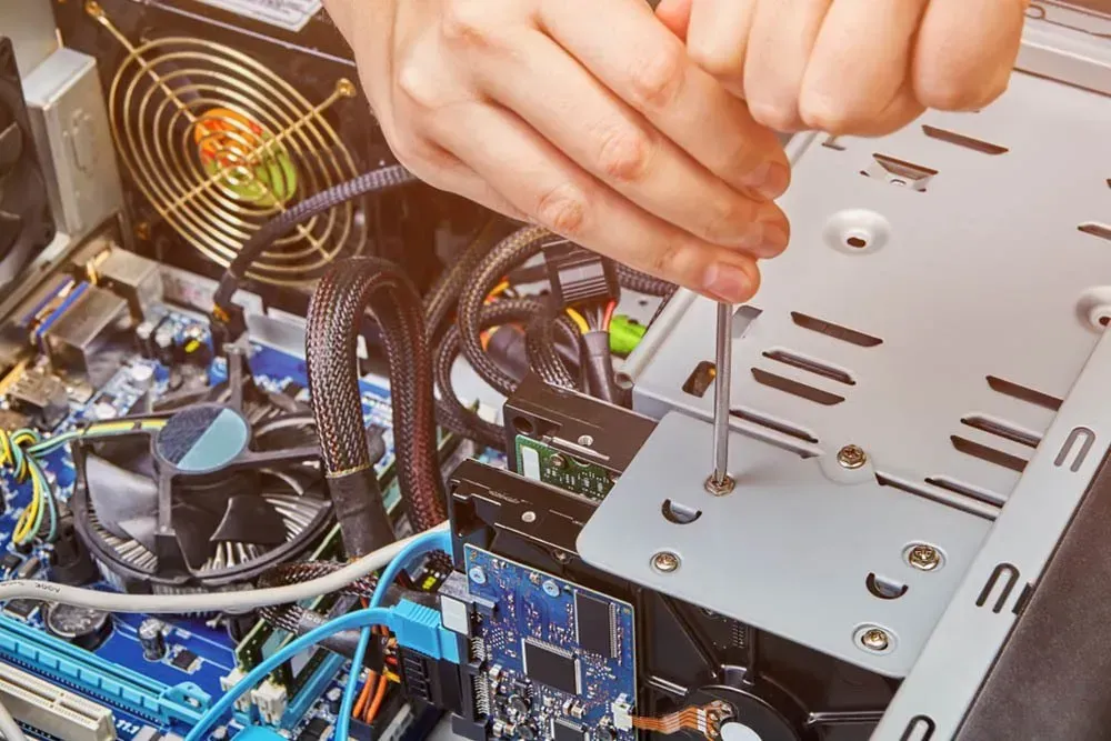 Computer Disassembled on a Table, Including Circuit Boards, Power Supply, and Fan — Micromac Computers in Charmhaven, NSW