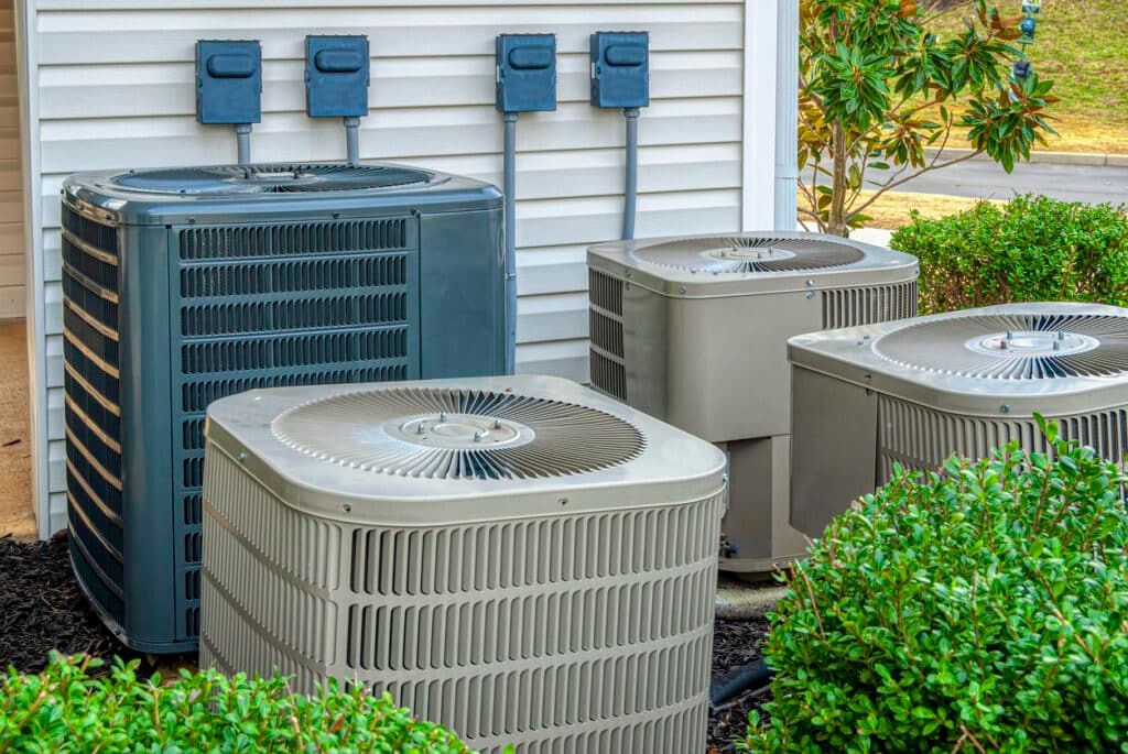 Horizontal Shot of Four Air Conditioners - Green Bay, Wisconsin - Nicolet Heating & Cooling