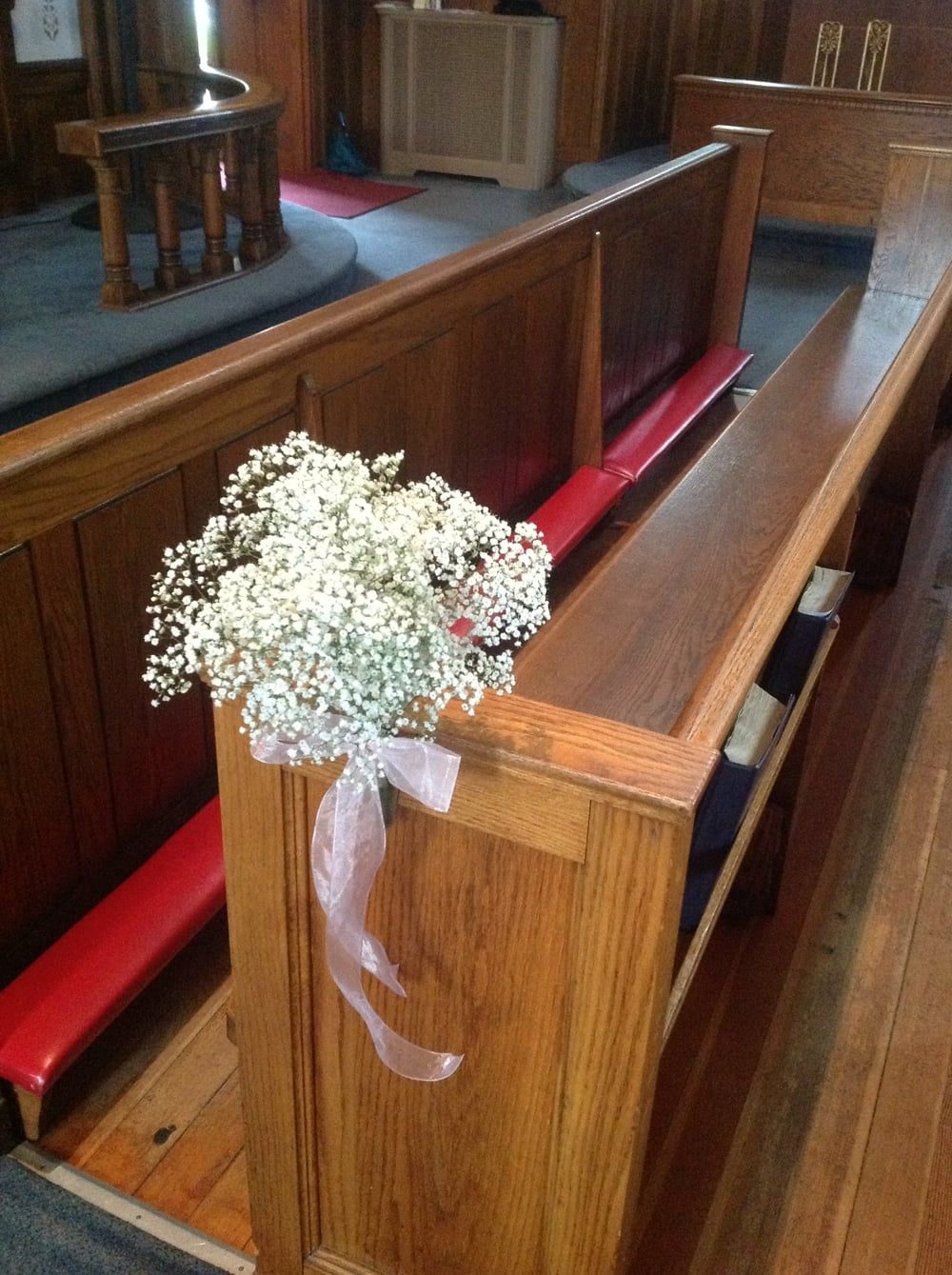 Flowers on Pew