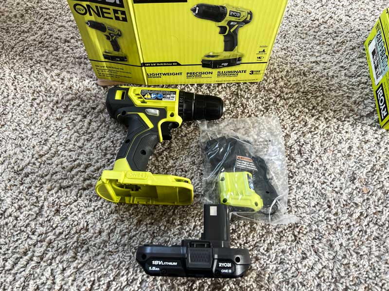 ryobi drill serving as a battery and charger donor for my ryobi tire inflator