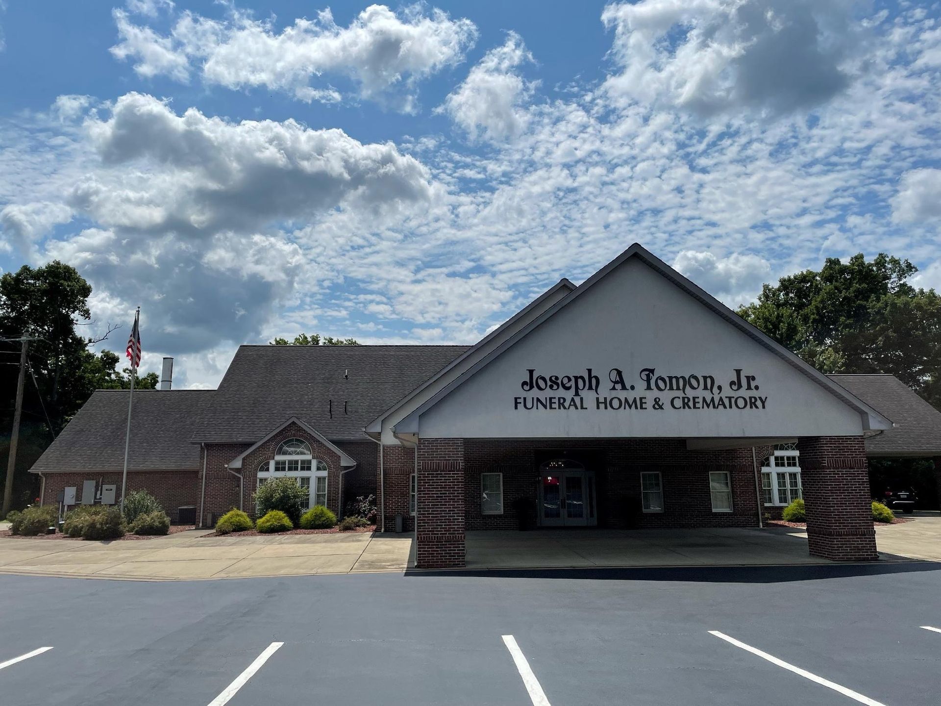 A large brick building with a sign that says joseph a. terreng jr. funeral home & crematory