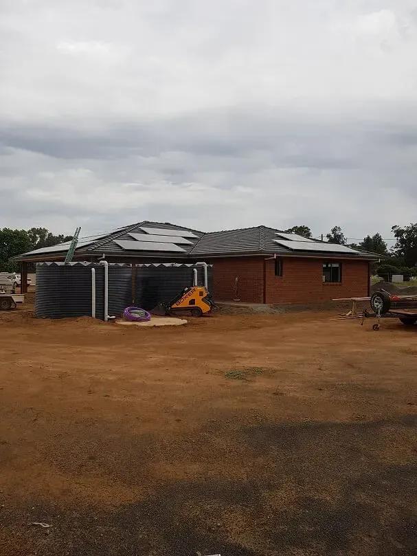 Solar panel construction on brick house