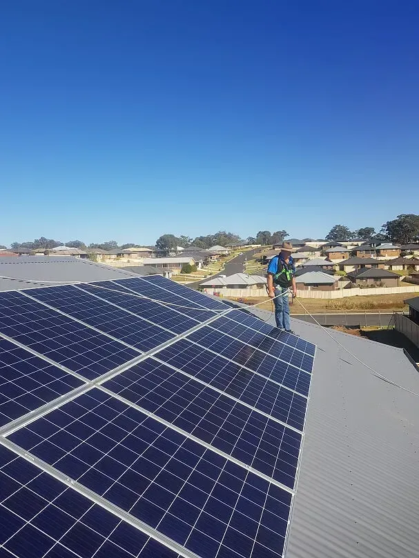 Team installing solar panels