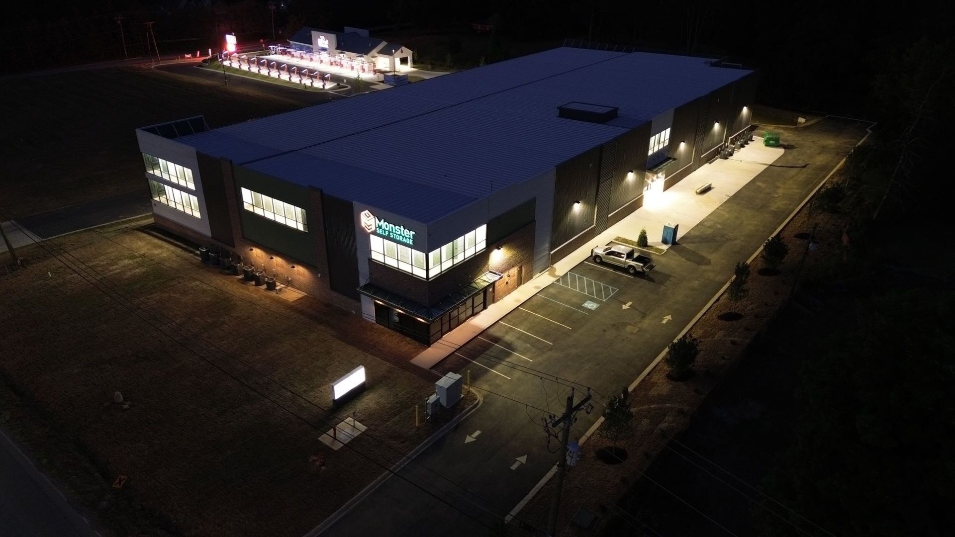 An aerial view of a large building at night.