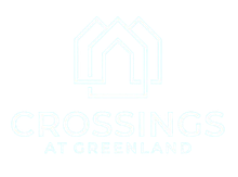 Logo for Crossings at Greenland, white house outlines on a turquoise background.