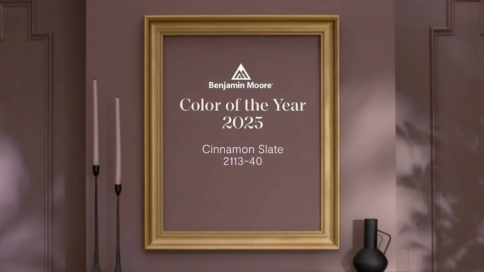 A living room painted in Cinnamon Slate 2113-40, Benjamin Moore Color of the Year 2025 near Holland,