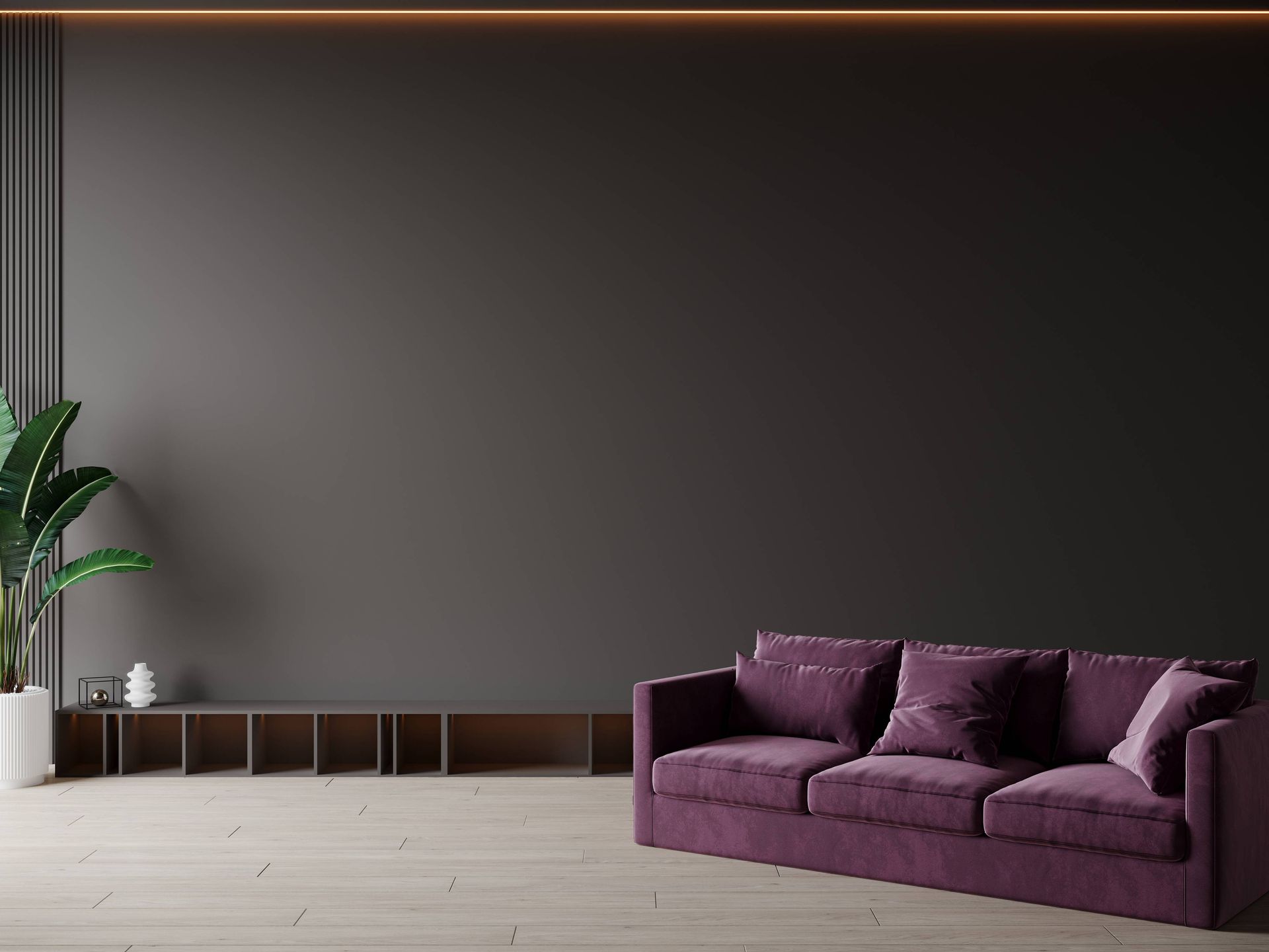 Mulberry sofa with charcoal gray walls and shelving units near Holland, Ohio