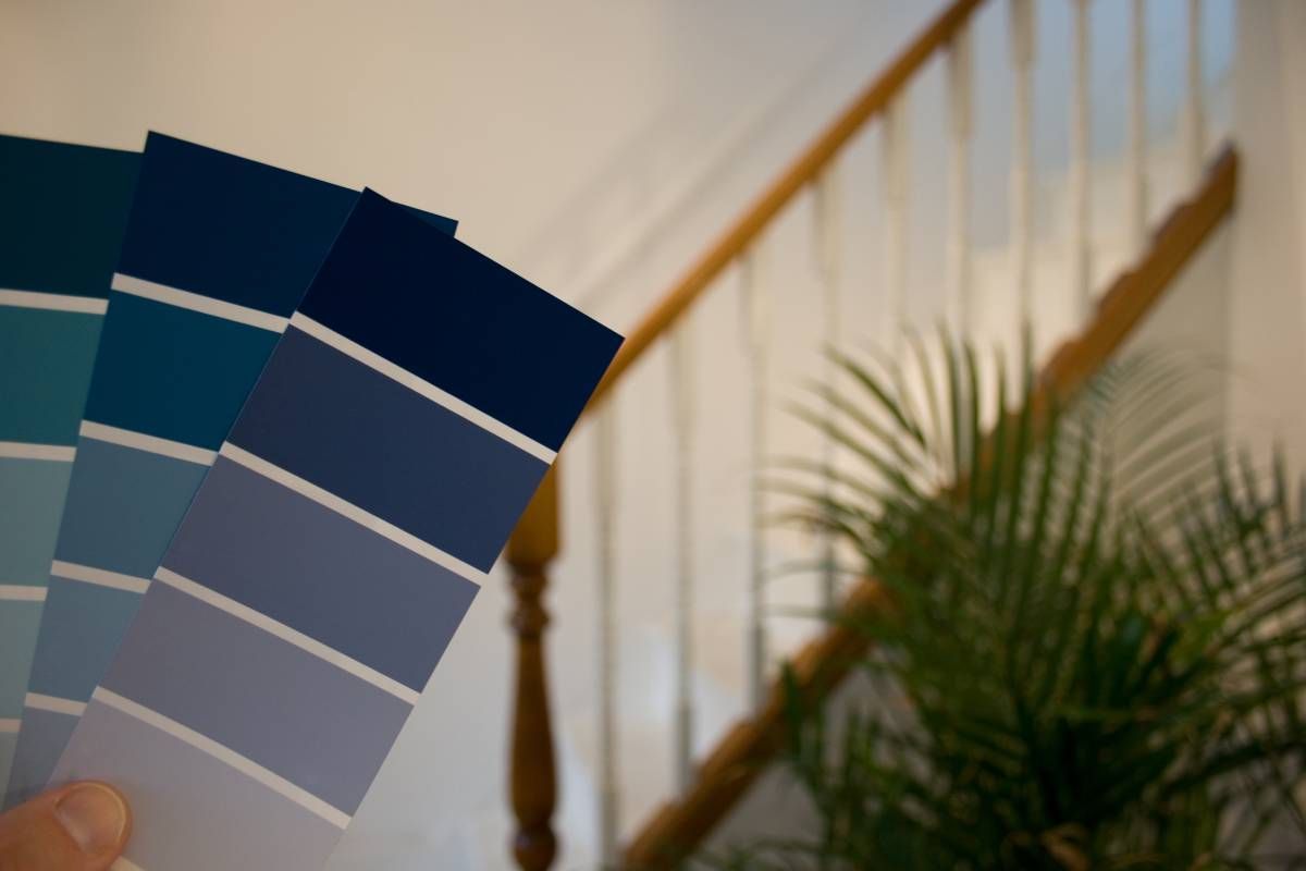 Using color swatches in a home to find the best satin-finish paints at 21st Century Paints near Holland, Ohio (OH)