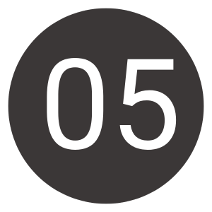 Dark gray circle with the number 