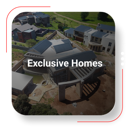 Aerial view of large, modern homes; text reads 