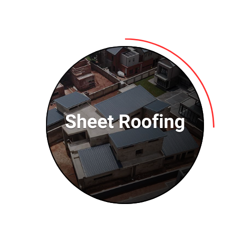 Aerial view of buildings with dark sheet roofing.  Text overlay: 
