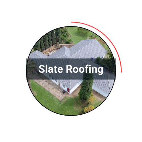 Aerial view of a house with gray slate roofing, labeled 