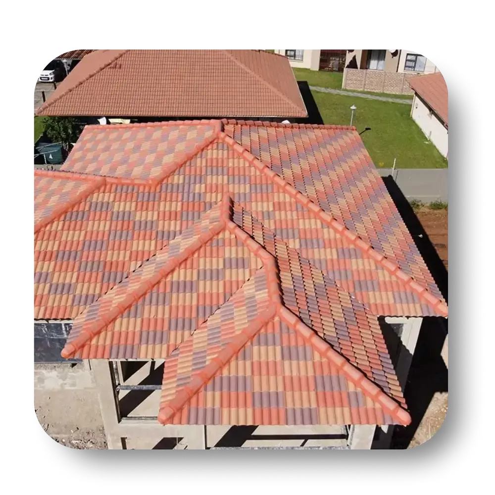 A colorful tile roof on a new home construction, with red, orange, and purple tiles.