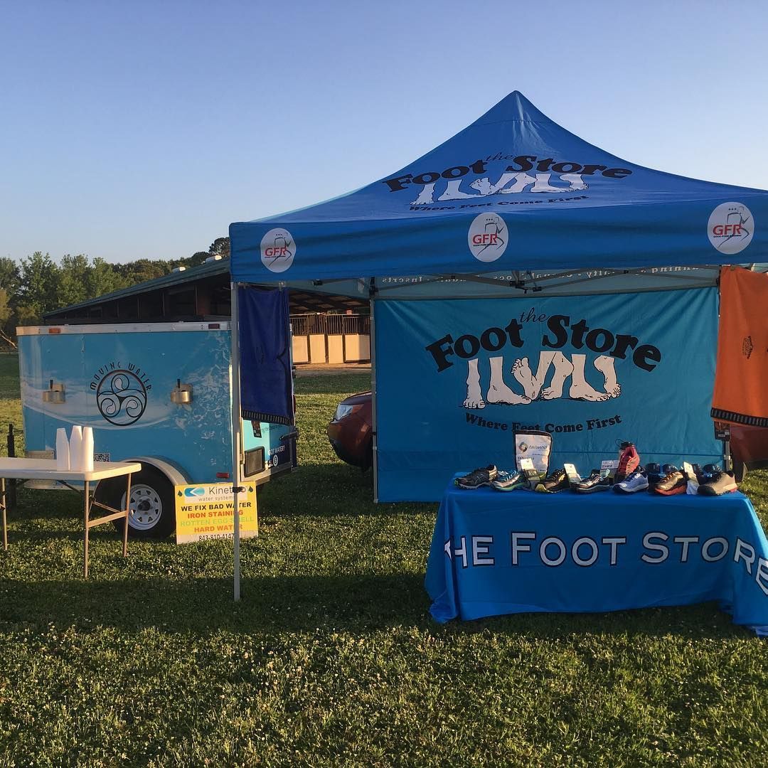 A blue tent with the word foot store on it